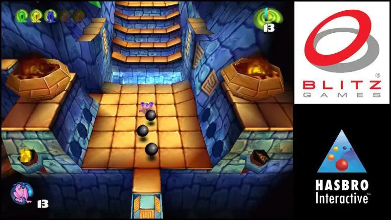 Frogger 2 gameplay with a pink frog perilously avoiding rolling balls of stone in an underground cavern.