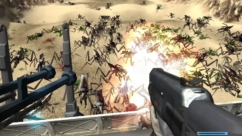 Starship Troopers gameplay, showing the player firing a weapon from an elevated position in a base, as hundreds of alien bugs attack in hordes across a desert-like planet.